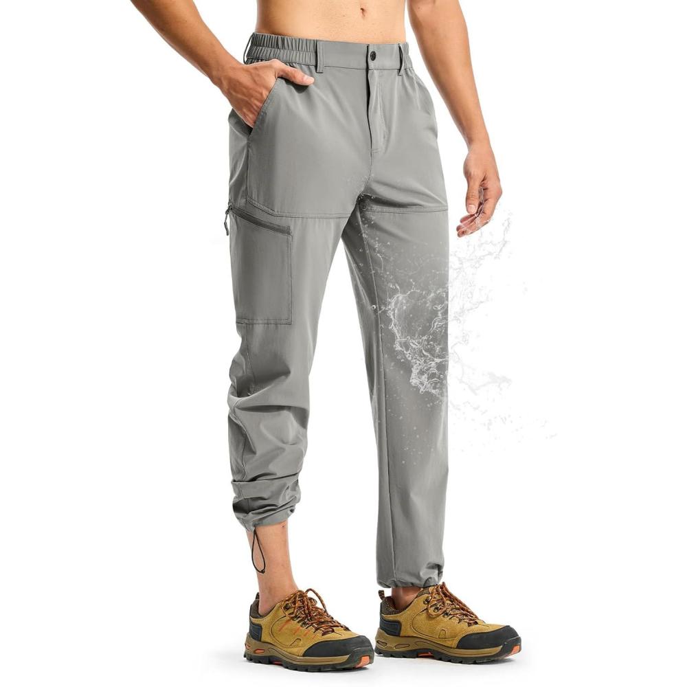 imageTBMPOY Mens Lightweight Hiking Pants Quick Dry 4 Pockets Stretch Water Resistant Travel Fishing Convertible Zip Cargo JoggerLight Grey