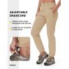 imageTBMPOY Womens Lightweight Hiking Pants Water Resistant Quick Dry Travel Work Outdoor Fishing Pants Zipper PocketsLight Khaki