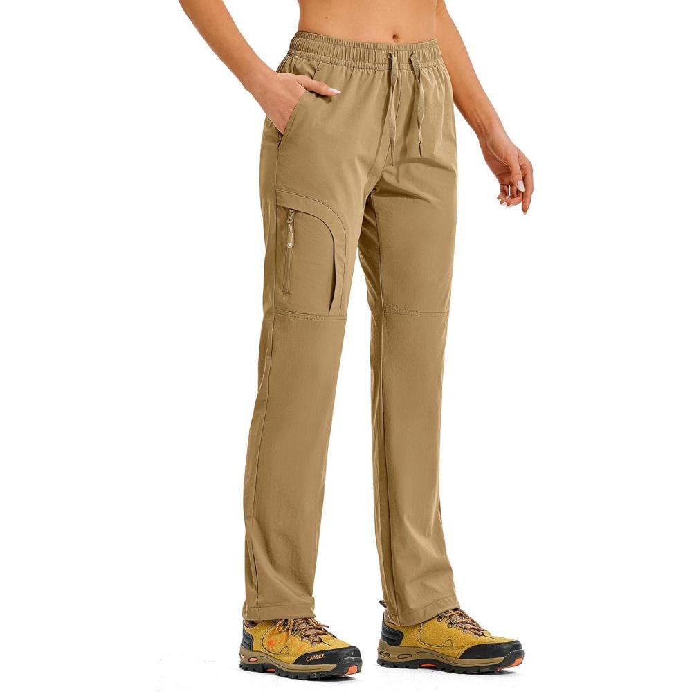 imageTBMPOY Womens Hiking Pants Water Resistant Lightweight Quick Dry Cargo Travel Fishing Work Camping Pant with 4 PocketsKhaki