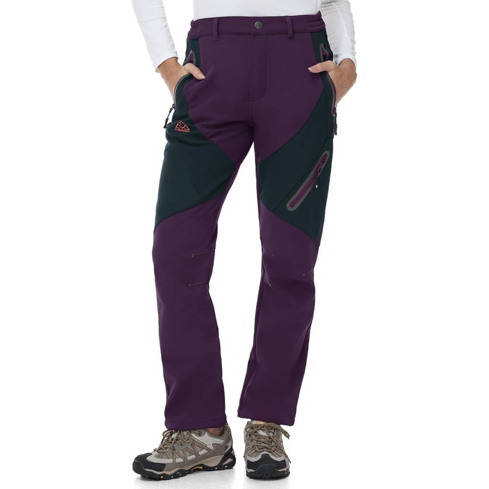 imageTBMPOY Womens Fleece Lined Ski Snow Pants Waterproof Winter Cargo Hiking Warm Thermal Softshell Insulated Outdoor PantPurple