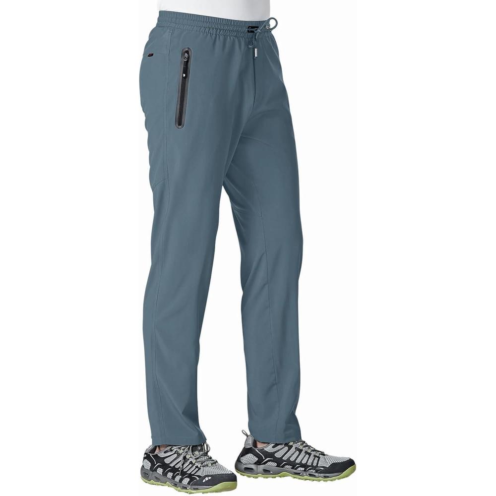 imageTBMPOY Mens Lightweight Hiking Travel Pants Athletic Outdoor Sports Elastic Waist Water Resistant Sweatpants 2 PocketsA16stone Blue