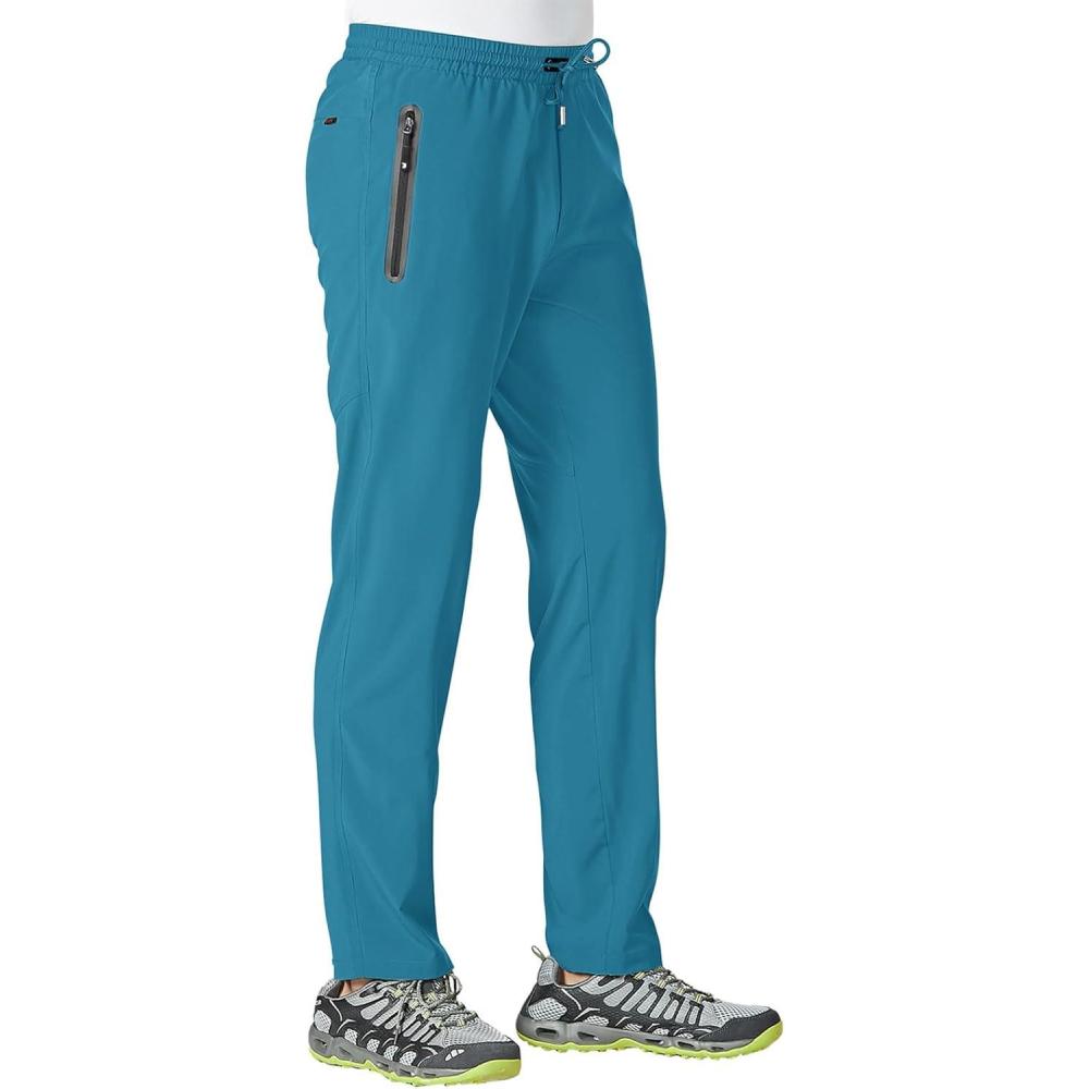 imageTBMPOY Mens Lightweight Hiking Travel Pants Athletic Outdoor Sports Elastic Waist Water Resistant Sweatpants 2 PocketsA19indigo