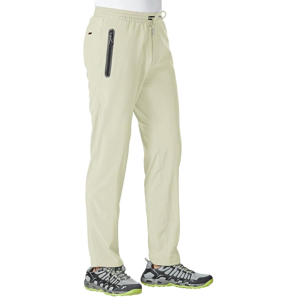 imageTBMPOY Mens Lightweight Hiking Travel Pants Athletic Outdoor Sports Elastic Waist Water Resistant Sweatpants 2 PocketsB13cream