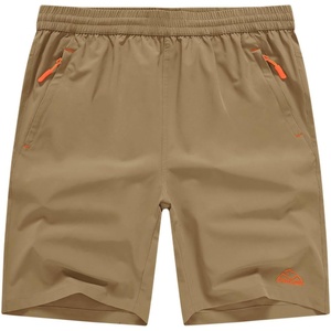 image:imageTBMPOY Mens 7 Running Hiking Shorts Quick Dry Athletic Gym Outdoor Sports  3 Zip Pockets Water Resistant Lightweight Workout Short UPF 50 for Fishing Activrwear Summer Travel Casual WorkKhaki