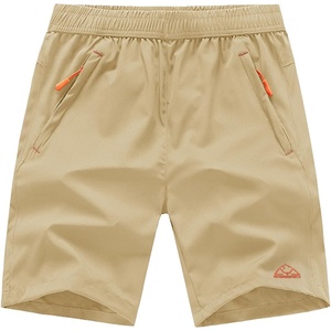image:imageTBMPOY Mens 7 Running Hiking Shorts Quick Dry Athletic Gym Outdoor Sports  3 Zip Pockets Water Resistant Lightweight Workout Short UPF 50 for Fishing Activrwear Summer Travel Casual WorkA24light Khaki