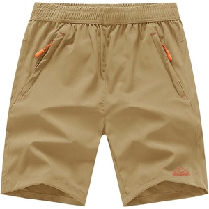 image:imageTBMPOY Mens 7 Running Hiking Shorts Quick Dry Athletic Gym Outdoor Sports  3 Zip Pockets Water Resistant Lightweight Workout Short UPF 50 for Fishing Activrwear Summer Travel Casual WorkA5khaki